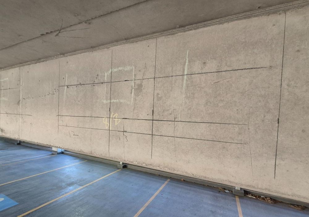 anchors on wall in parking garage